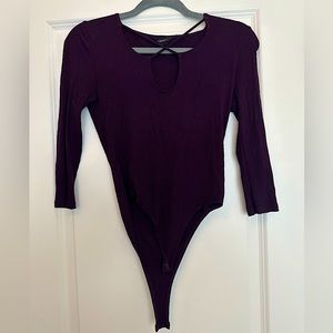 Plum/dark purple stretchy body suit. GREAT condition.